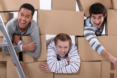 Packed moving boxes ready for transport from a Wimbledon property