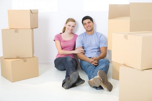 Moving van and packing boxes prepared for a house removal in Wimbledon