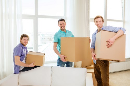 Local moving truck transporting furniture in Wimbledon