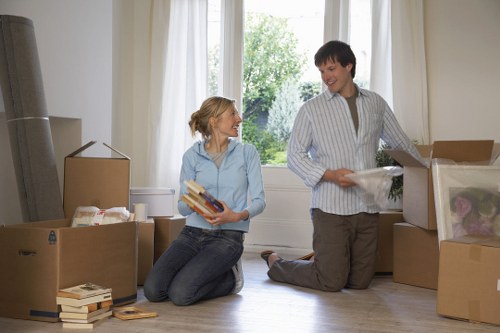 Furniture and boxes being loaded into a removal van in Wimbledon